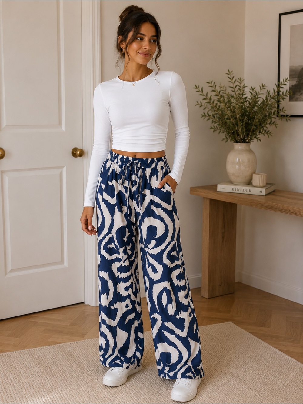 Set-Chic Blue and White Patterned Wide Leg Pants and White Long Sleeve Top.